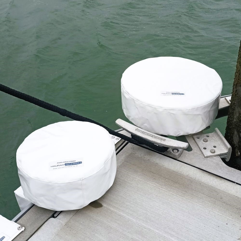 Heavy duty white pvc dock wheel covers for marina berths available from Hauraki Fenders
