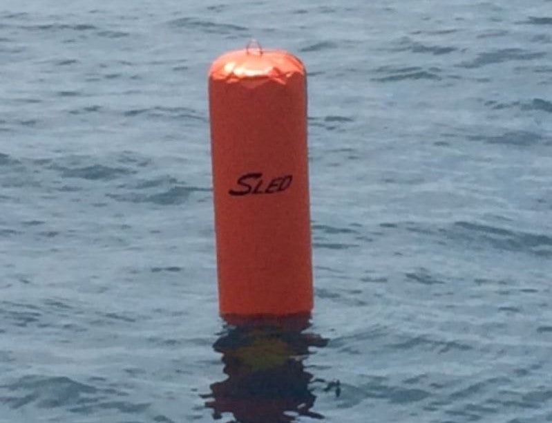 Customer photo of Hauraki inflatable fenders, covers and other products in use - TP52 Sled bouy