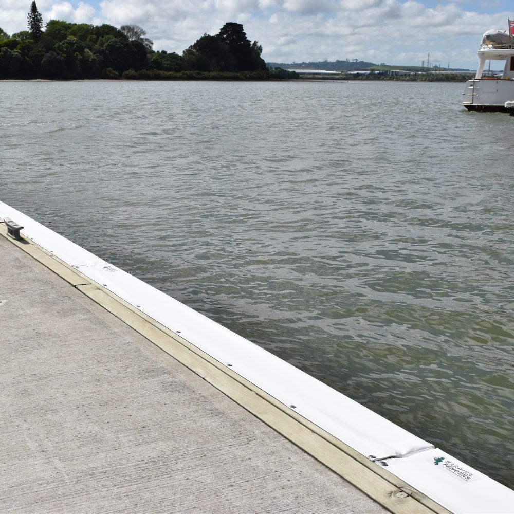 Contoured Barrier Fenders available from Hauraki Fenders - 2m pvc covered foam marina fender shaped to fit around a marina berth rub strip