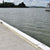 Contoured Barrier Fenders available from Hauraki Fenders - 2m pvc covered foam marina fender shaped to fit around a marina berth rub strip